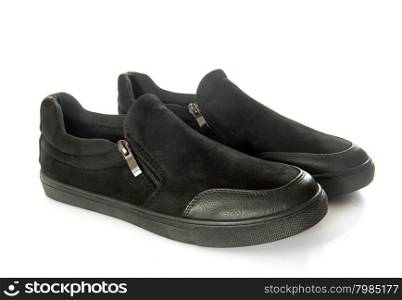 black shoes in front of white background