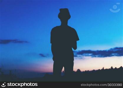 Black silhouette of alone man