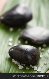 black spa stones and leaf