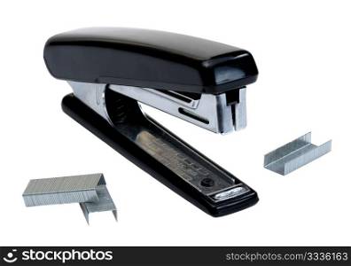 Black stapler and staples to him, isolated