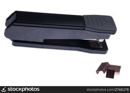 black stapler office equipment and staples isolated on white background
