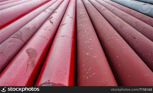 Black steel pipe painted in red for fire production system in the factory
