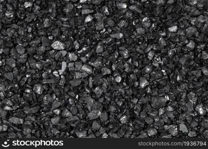 Black stone abstract background texture. Full frame
