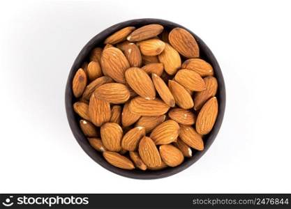 Black stone bowl of almonds nuts on a white background
