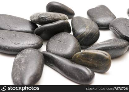 black stones on a white background