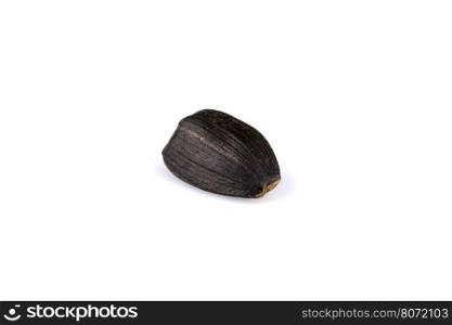 black sunflower seed isolated on a white background