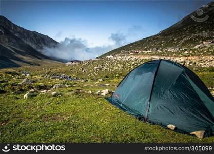 Black tent on the top of the Kackar Mountains.A popular place for hiking and camping every season in Rize,Turkey. Black tent on the top of the Kackar Mountains in Rize,Turkey