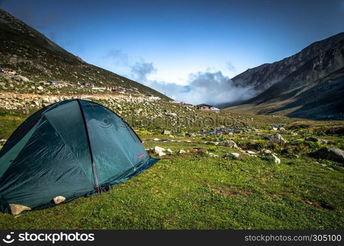 Black tent on the top of the Kackar Mountains.A popular place for hiking and camping every season in Rize,Turkey. Black tent on the top of the Kackar Mountains in Rize,Turkey