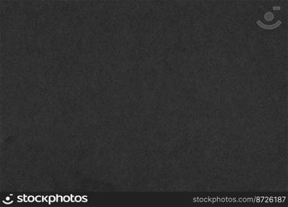black texture for background. close up black paper embellishing colors dark black and faded white