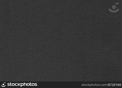 black texture for background. close up black paper embellishing colors dark black and faded white