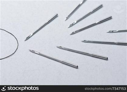black thread and industrial needle