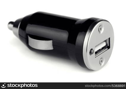 Black USB electronics device car charger isolated on white