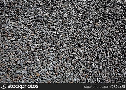 Black volcanic lava stones pattern texture background