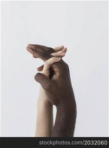 black white hands holding sideways