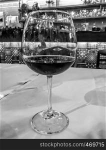 Black White Photography Of Two Glasses Of Wine In A Luxury Restaurant