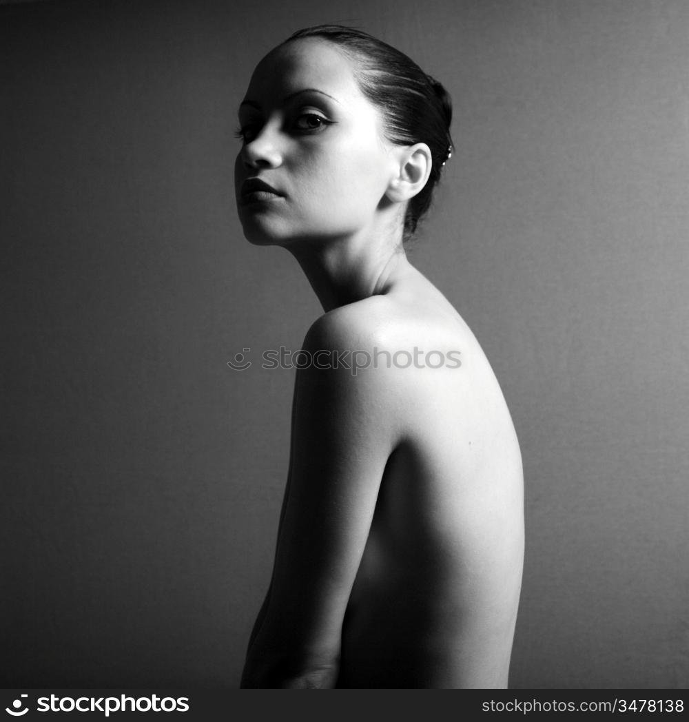 Studio fashion photo of nude fitness woman. Perfect body. Health