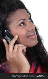 black woman at phone