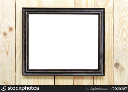 Black wood frame on wooden floor.. Black wood frame on wooden floor and have square of copy space.