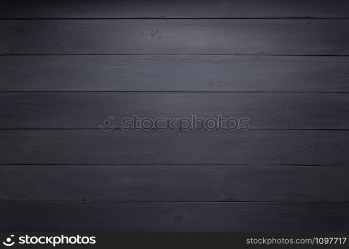 black wooden background as texture surface, top view