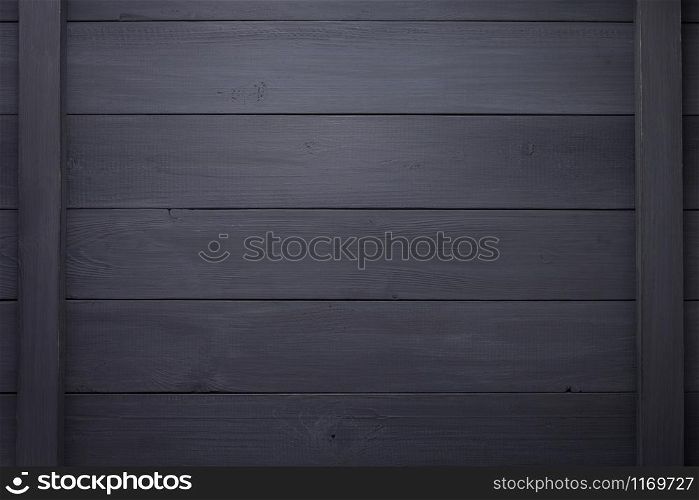 black wooden background as texture surface, top view