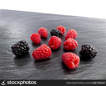 Blackberries and raspberries on a slate plate &#xA;&#xA;