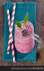 Blackberries smoothie drink with ice