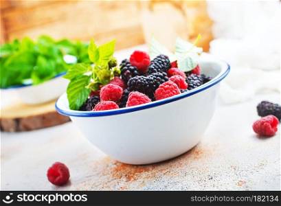 blackberry and raspberry in bowl, stock photo