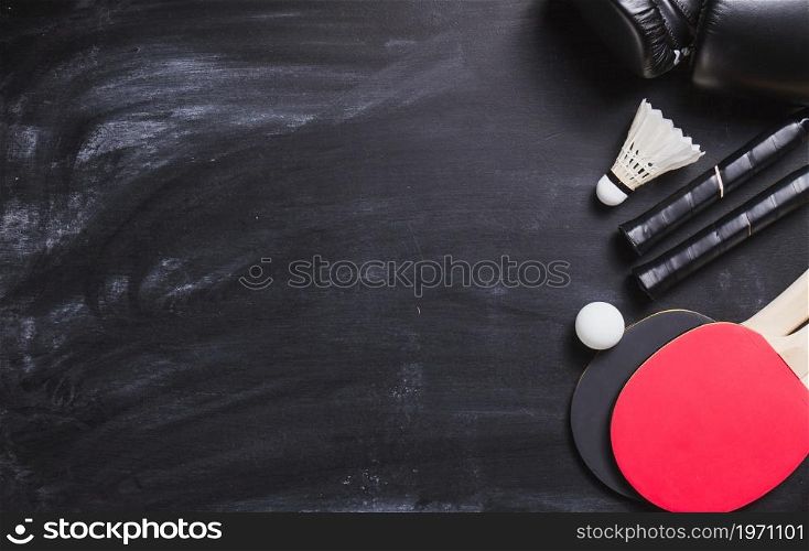 blackboard background with ping pong rackets ball. High resolution photo. blackboard background with ping pong rackets ball. High quality photo
