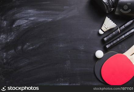 blackboard background with ping pong rackets ball. High resolution photo. blackboard background with ping pong rackets ball. High quality photo