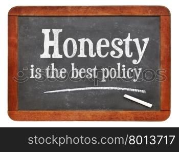 blackboard. Honesty is the best policy proverb - white chalk text on a vintage slate blackboard