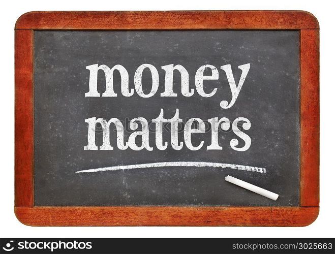 blackboard. money matters - white chalk text on a vintage slate blackboard