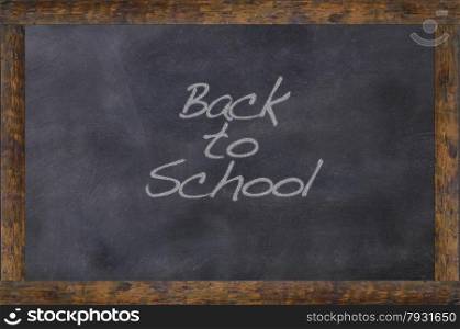 Blackboard school class with the phrase Back to school.