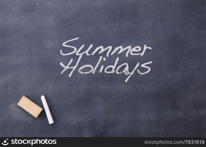 Blackboard school class with the phrase Summer Holidays.