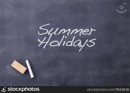Blackboard school class with the phrase Summer Holidays.