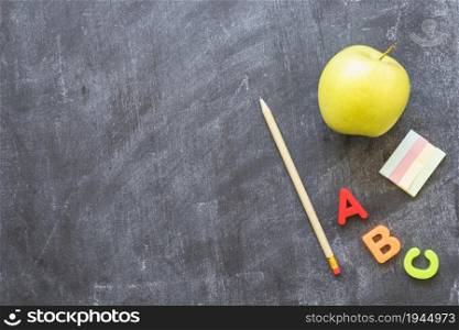 blackboard with stationery alphabet letters apple. High resolution photo. blackboard with stationery alphabet letters apple. High quality photo