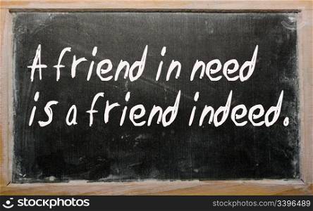 "Blackboard writings "A friend in need is a friend indeed""
