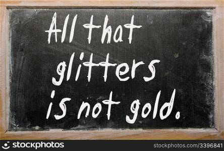 "Blackboard writings "All that glitters is not gold""