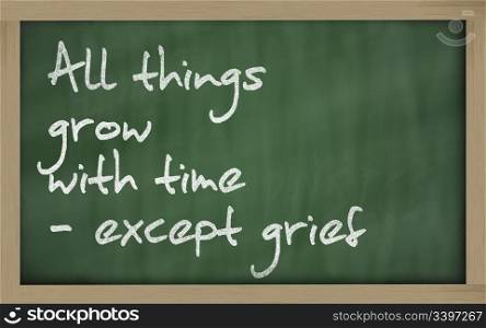 "Blackboard writings " All things grow with time - except grief ""