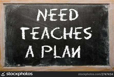 "Blackboard writings "Need teaches a plan""