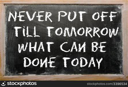 "Blackboard writings "Never put off till tomorrow what can be done today""