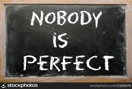 "Blackboard writings "Nobody is perfect""
