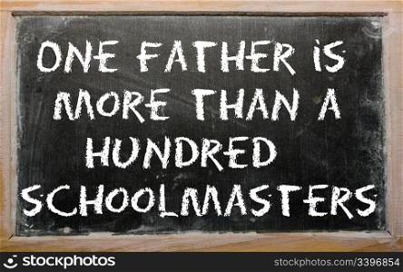 "Blackboard writings "One father is more than a hundred schoolmasters""
