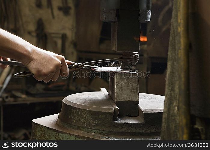 Blacksmith Shaping Metal