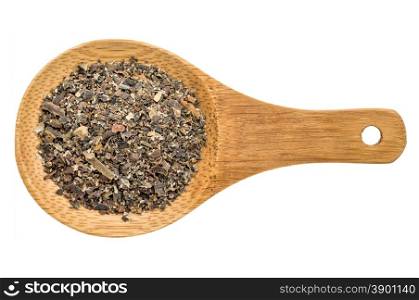 bladderwrack seaweed flakes - top view of a wooden spoon isolated on white