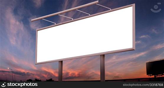 Blank big billboard over sunset sky