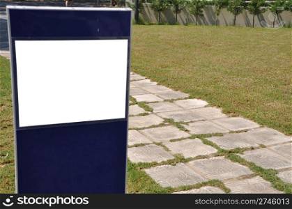 blank billboard and stone walkway in the park