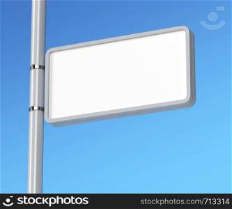 Blank billboard attached on column against blue sky