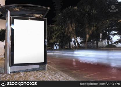 blank billboard bus stop shelter night