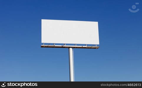 Blank billboard for new advertisement with blue sky background