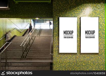 Blank billboard located in underground hall or subway for advertising, mockup concept, Low light speed shutter